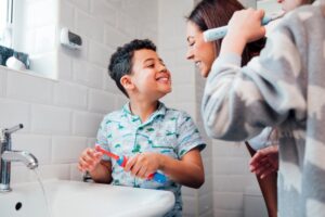 Child using an electric toothbrush